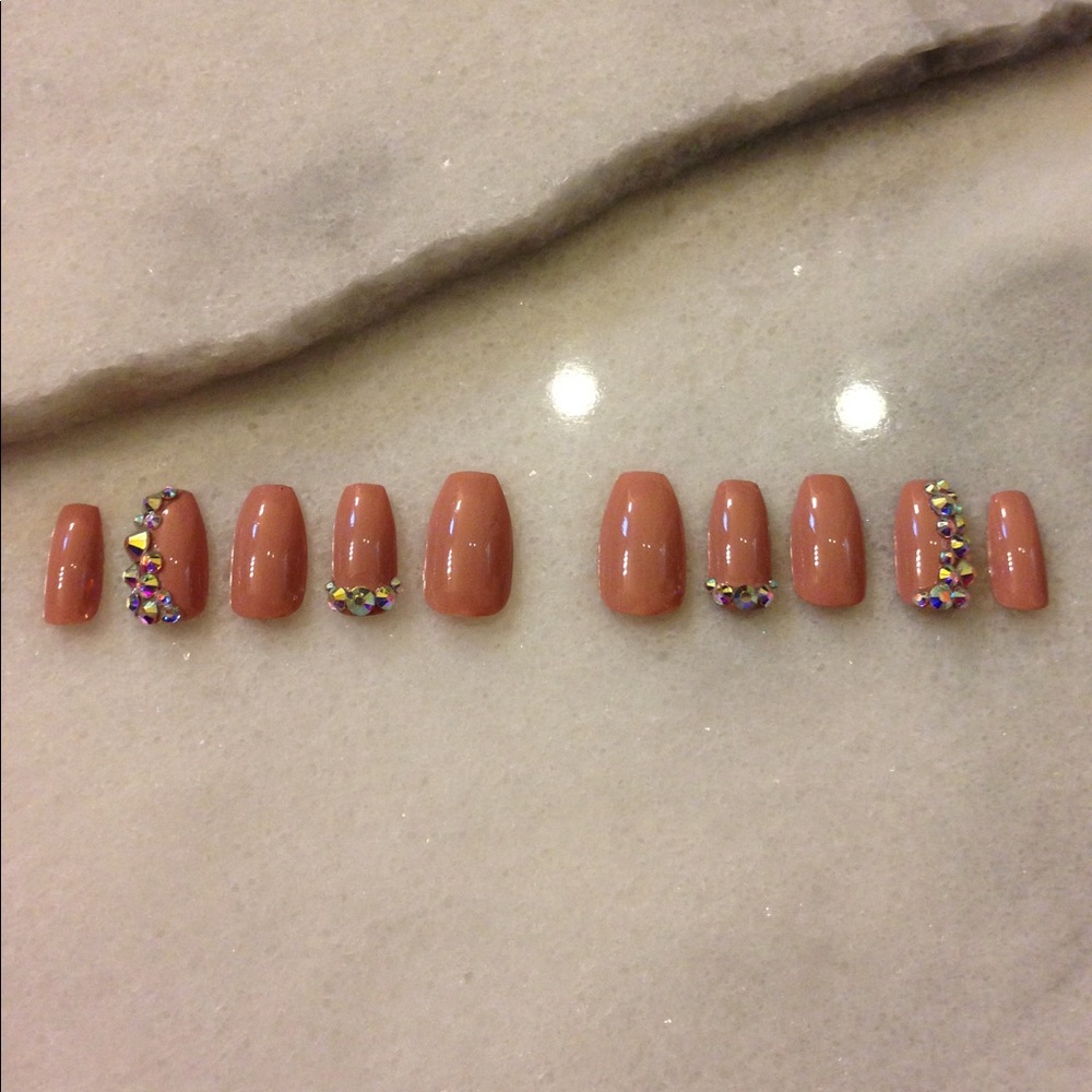 Glossy mauve/nude and rhinestone luxury press ons